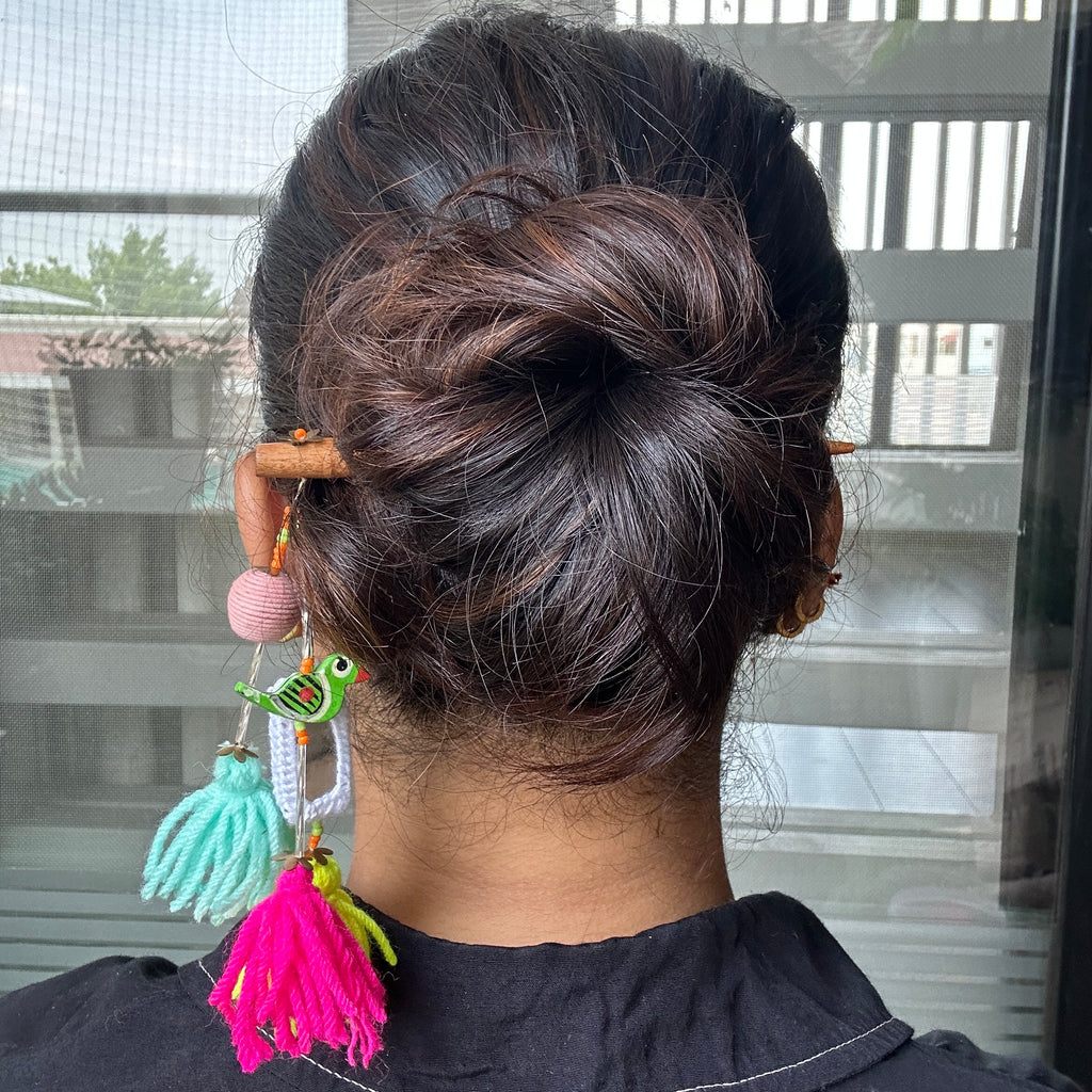 Parrot bun stick