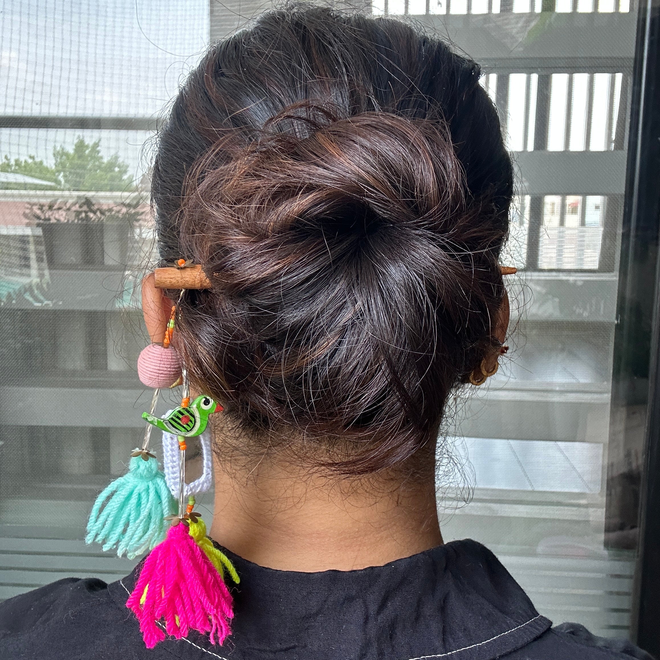 Parrot bun stick